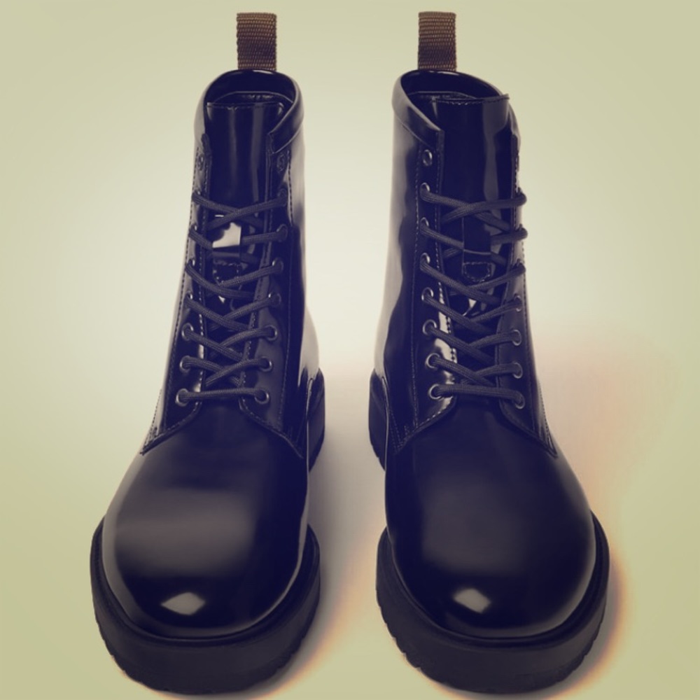 Black leather combat boots